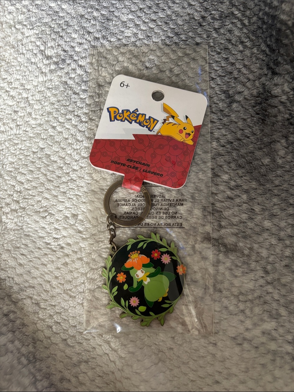 Pokemon Green Kirlia Floral Keychain with Black Backing